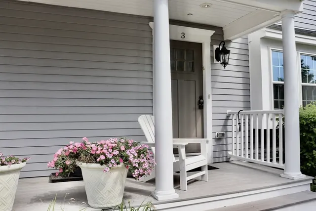 a picture of a tree in front of a house