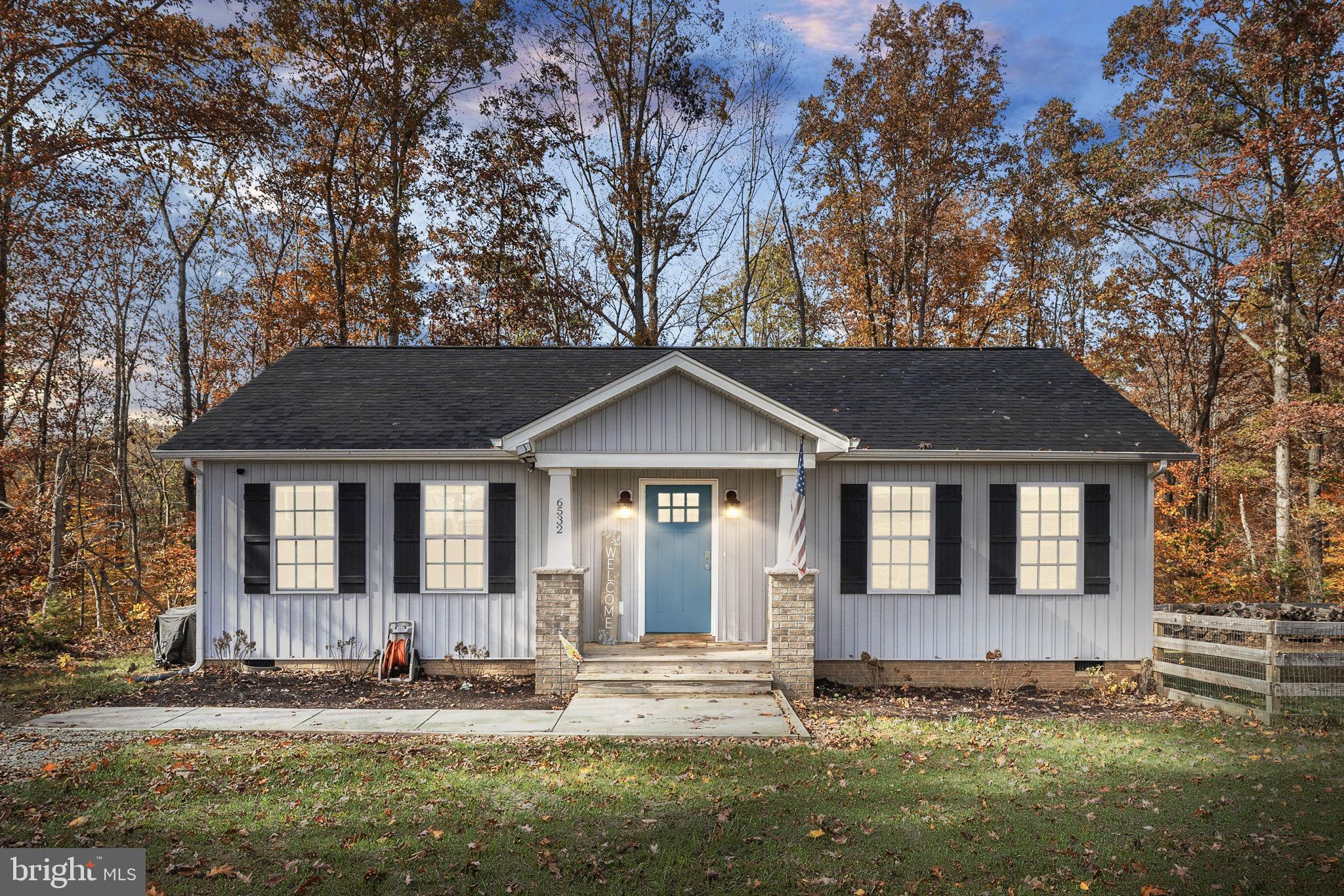 front view of house with a yard