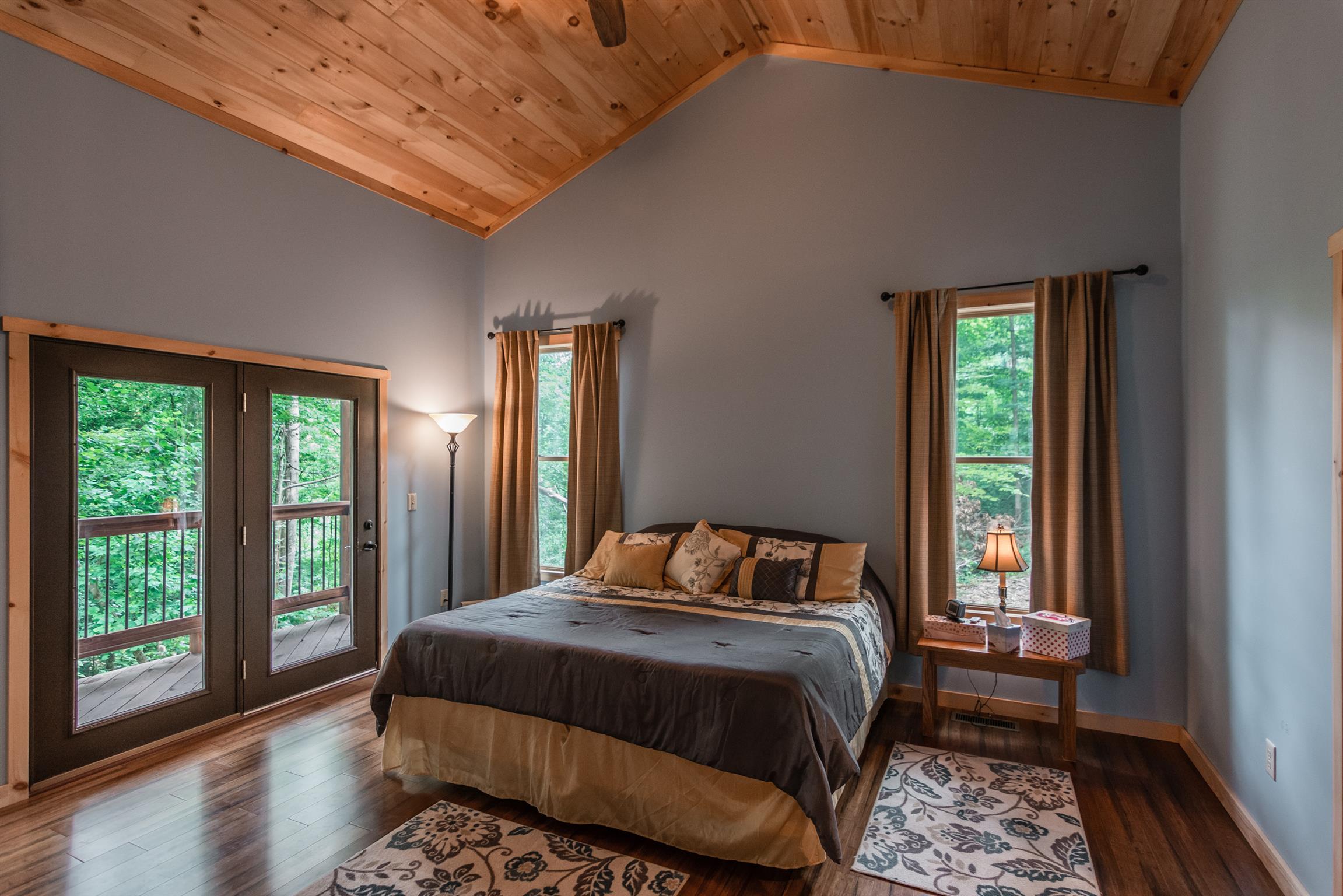 1279 Rogues Fork Road Bethpage, TN 37022 - Photo 20 of 30 a bedroom with a large bed and a window