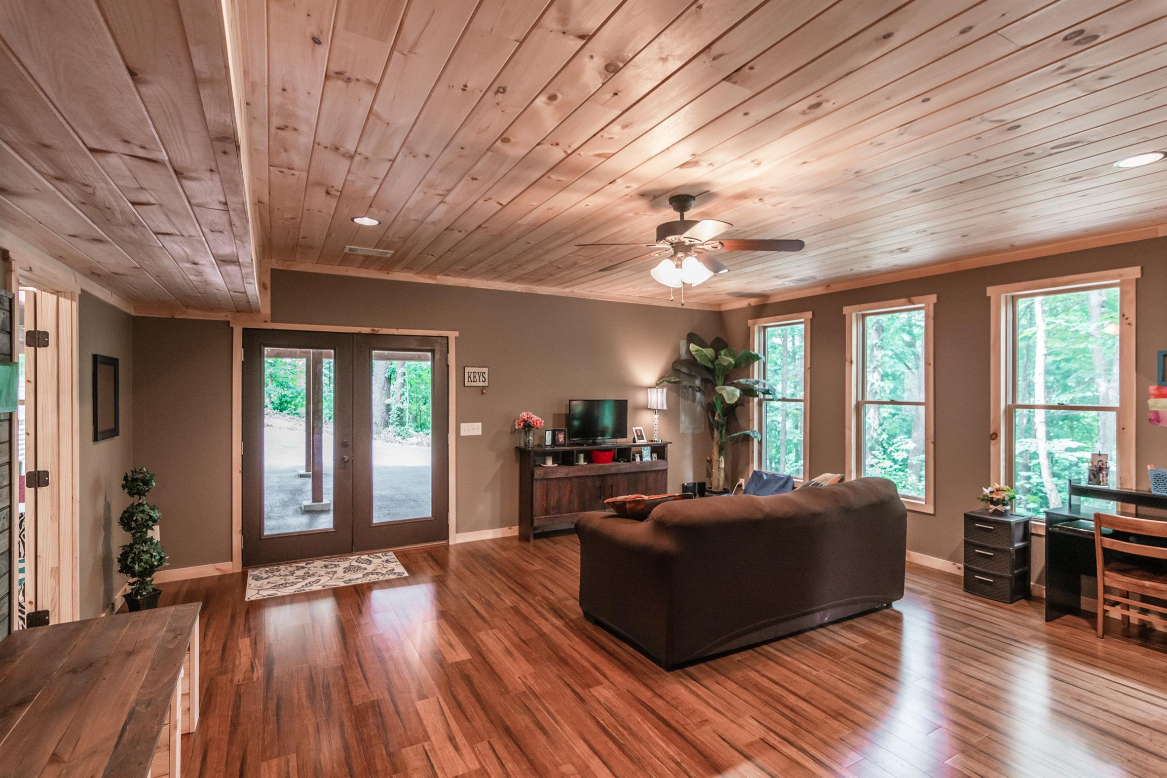 1279 Rogues Fork Road Bethpage, TN 37022 - Photo 26 of 30 a living room with furniture and wooden floor