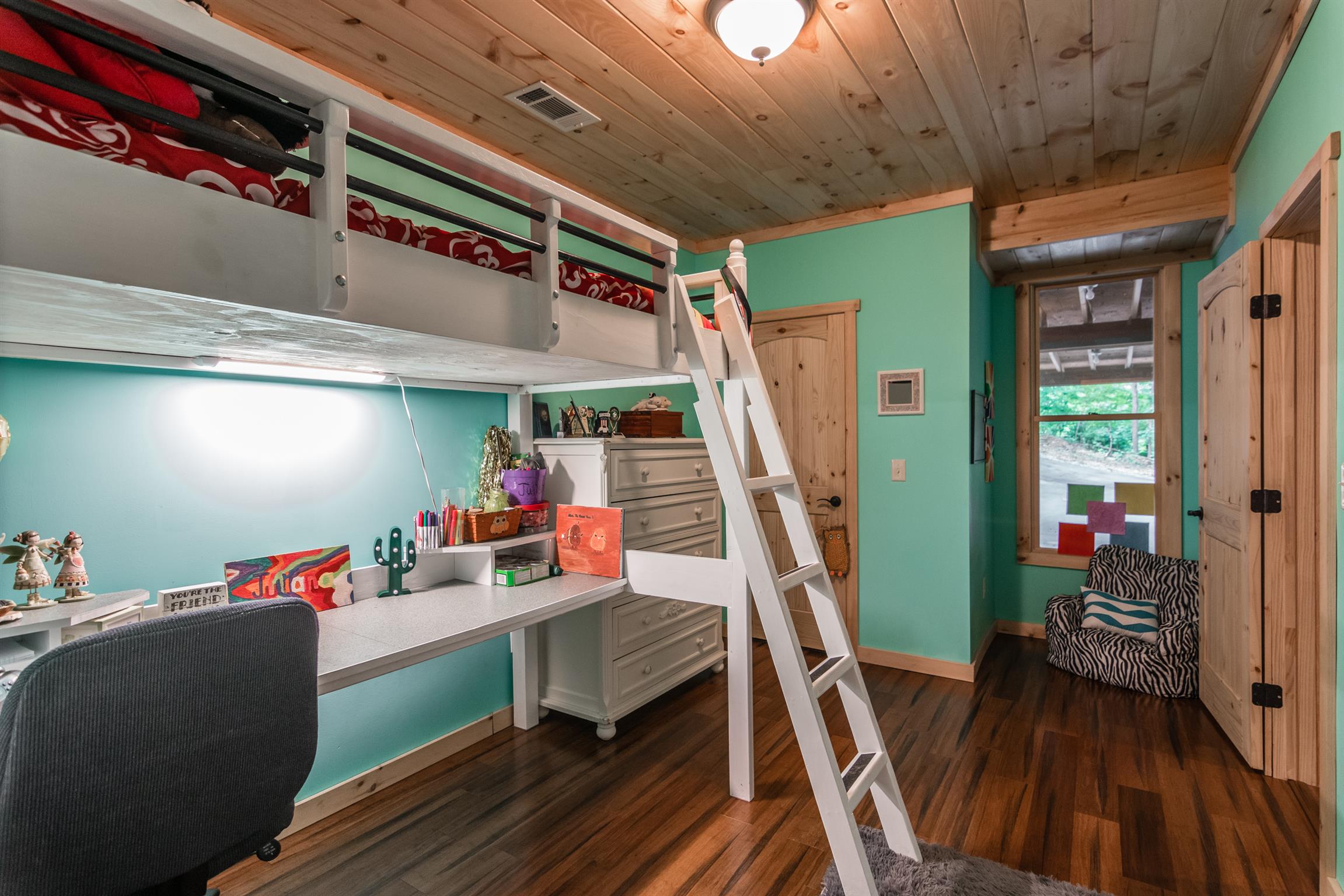 1279 Rogues Fork Road Bethpage, TN 37022 - Photo 27 of 30 a storage room with furniture and a wooden floors