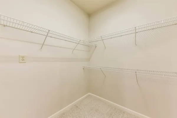 a view of a room with racks on the wall
