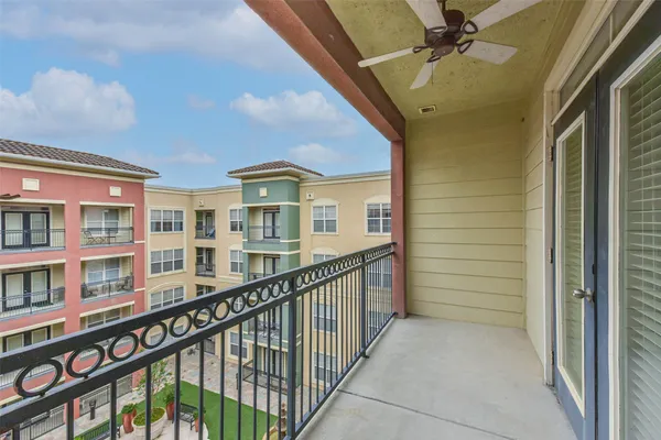 a view of a balcony and a window