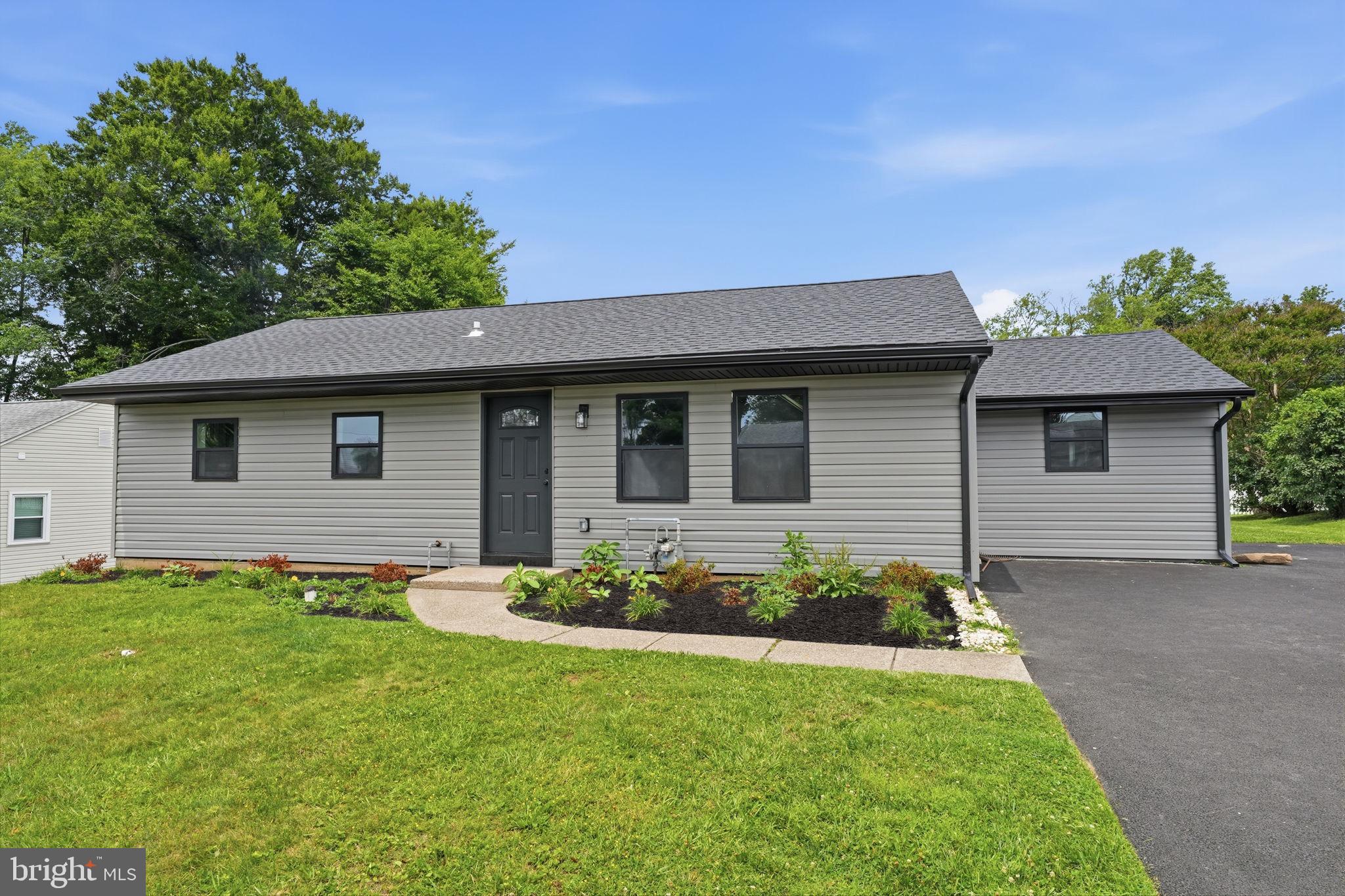 349 Andover Road Fairless Hills, PA 19030 - Photo 2 of 43 Charming home with lush landscaping.