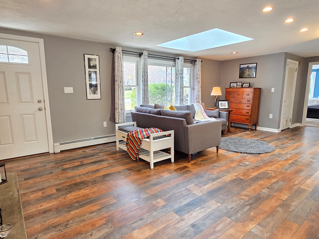 33 Pine Hill Road Ashland, MA 01721 - Photo 12 of 40 a living room with furniture and a large window