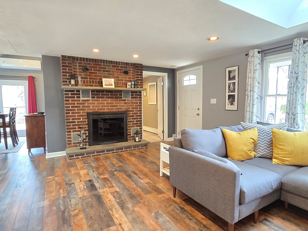 33 Pine Hill Road Ashland, MA 01721 - Photo 13 of 40 a living room with a couch and wooden floor