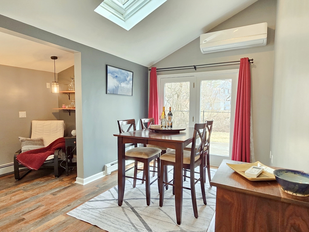 33 Pine Hill Road Ashland, MA 01721 - Photo 16 of 40 a view of a dining room with furniture window and wooden floor