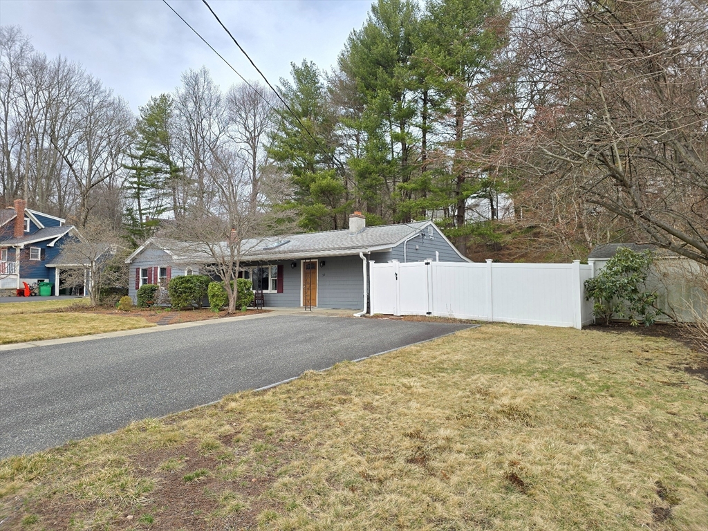 33 Pine Hill Road Ashland, MA 01721 - Photo 2 of 40 a view of a house with a yard and large tree