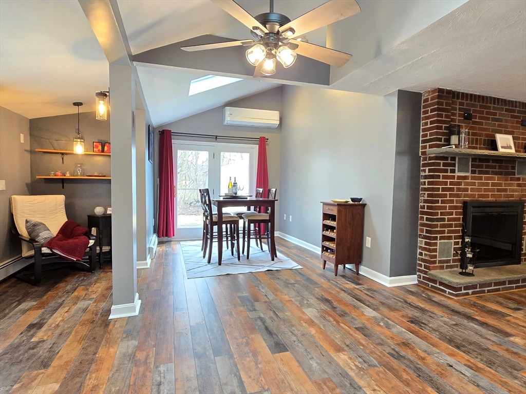 33 Pine Hill Road Ashland, MA 01721 - Photo 28 of 40 a view of a livingroom with furniture and a ceiling fan