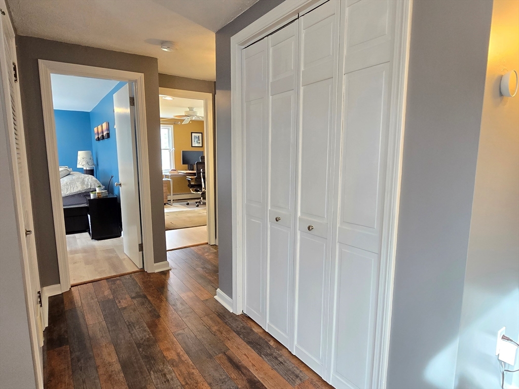 33 Pine Hill Road Ashland, MA 01721 - Photo 30 of 40 a view of a hallway with wooden floor