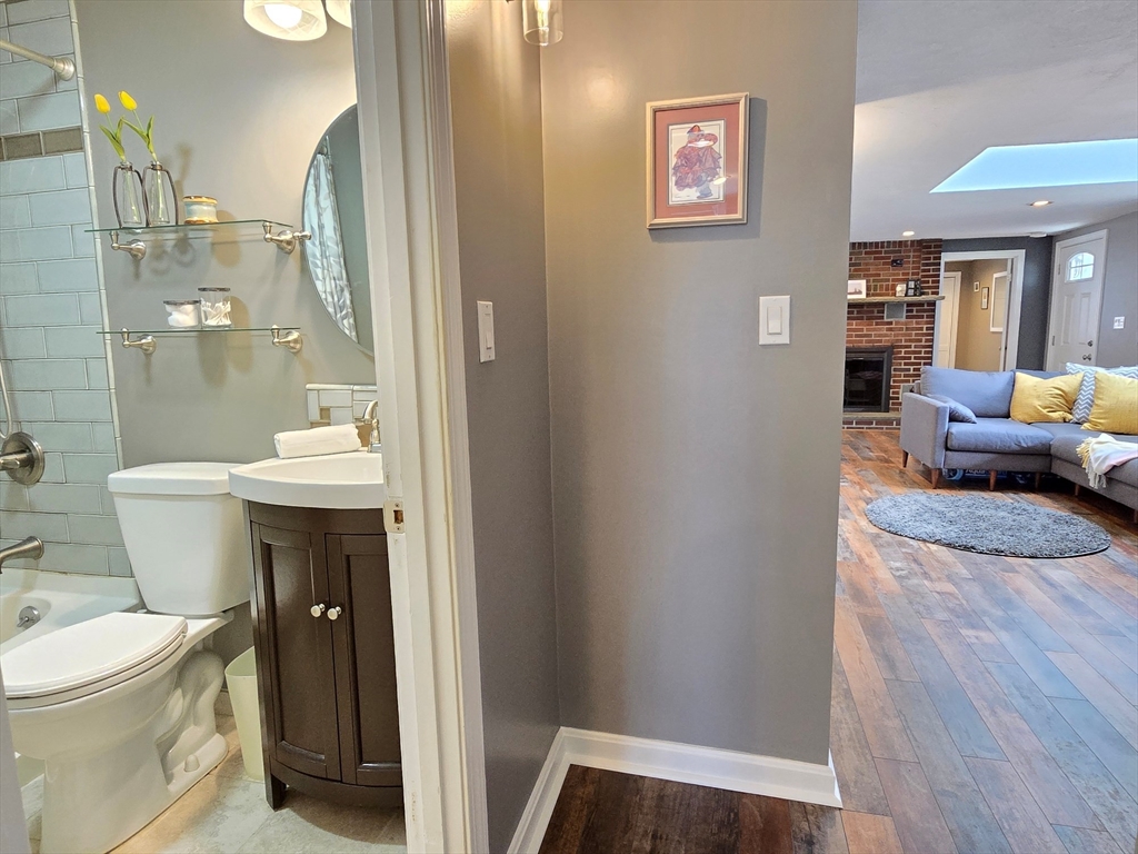 33 Pine Hill Road Ashland, MA 01721 - Photo 33 of 40 a bathroom with a sink a toilet and shower