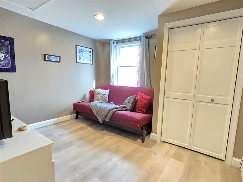 33 Pine Hill Road Ashland, MA 01721 - Photo 37 of 40 a living room with furniture and a window