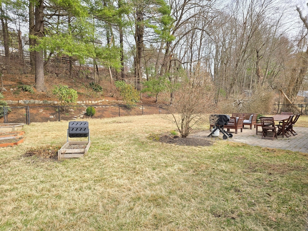 33 Pine Hill Road Ashland, MA 01721 - Photo 5 of 40 a view of a yard with table and chairs