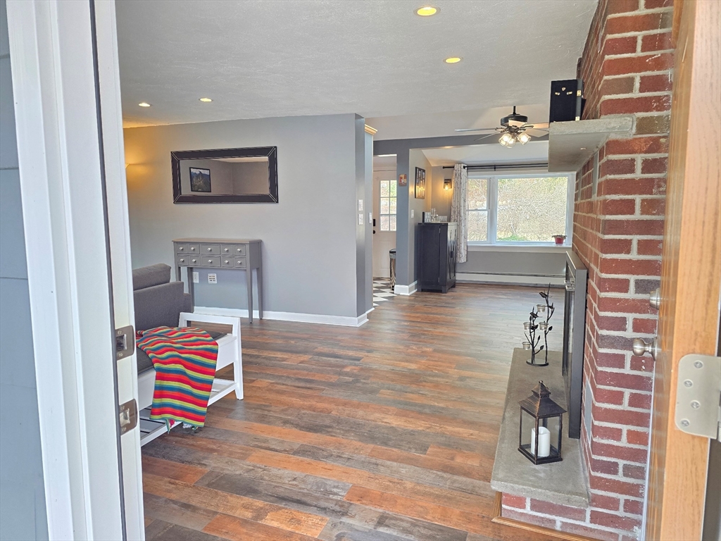 33 Pine Hill Road Ashland, MA 01721 - Photo 8 of 40 a room with wooden floor and window