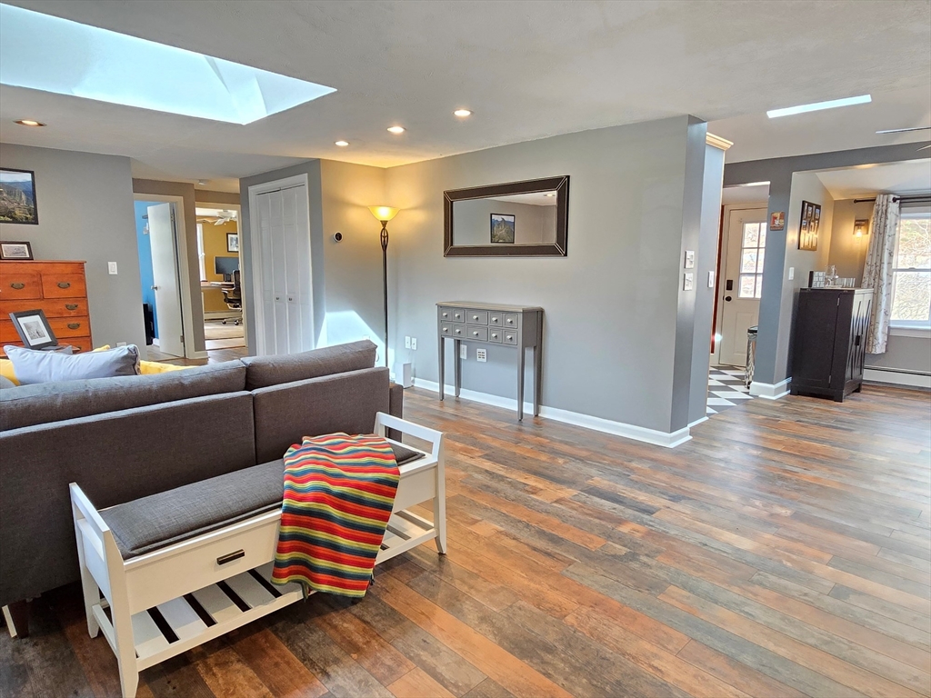 33 Pine Hill Road Ashland, MA 01721 - Photo 9 of 40 a living room with furniture and wooden floor