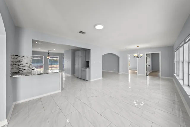 a view of an empty room and window