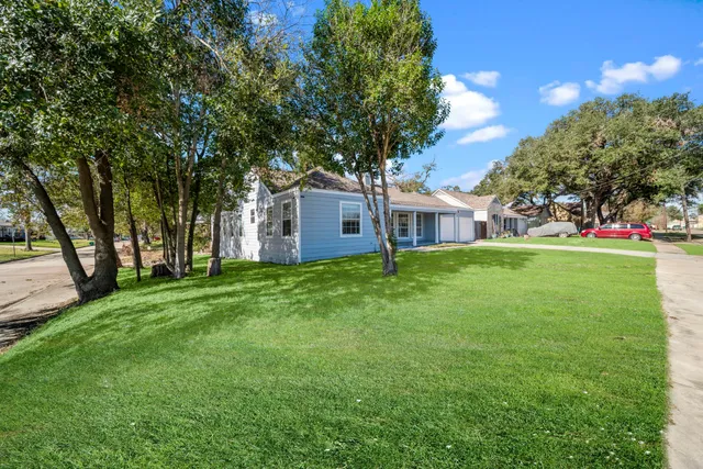 a house view with a garden space