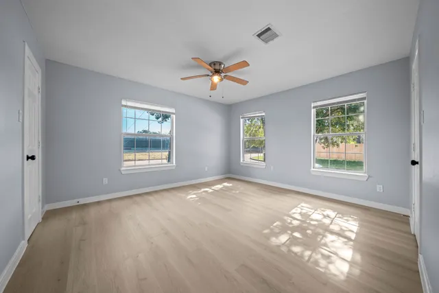 a view of a room with racks on the wall