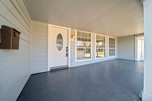 a view of a livingroom with a staircase