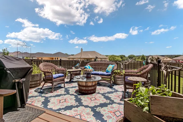 a view of a terrace with furniture