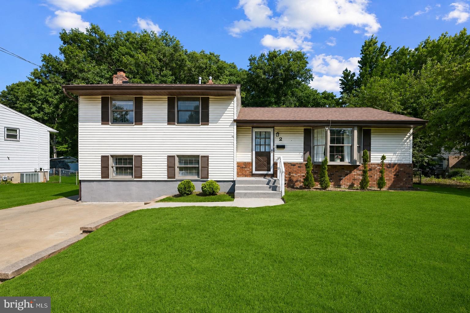 2 Farwood Road Gibbsboro, NJ 08026 - Photo 1 of 25 a front view of house with a garden and patio