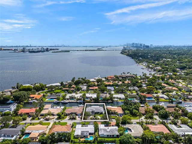 a view of a lake with a city view