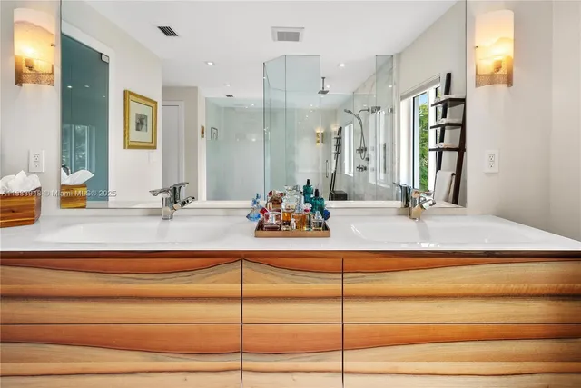 a view of a living room and wooden floor