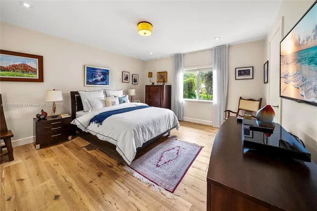 a view of house with swimming pool outdoor seating