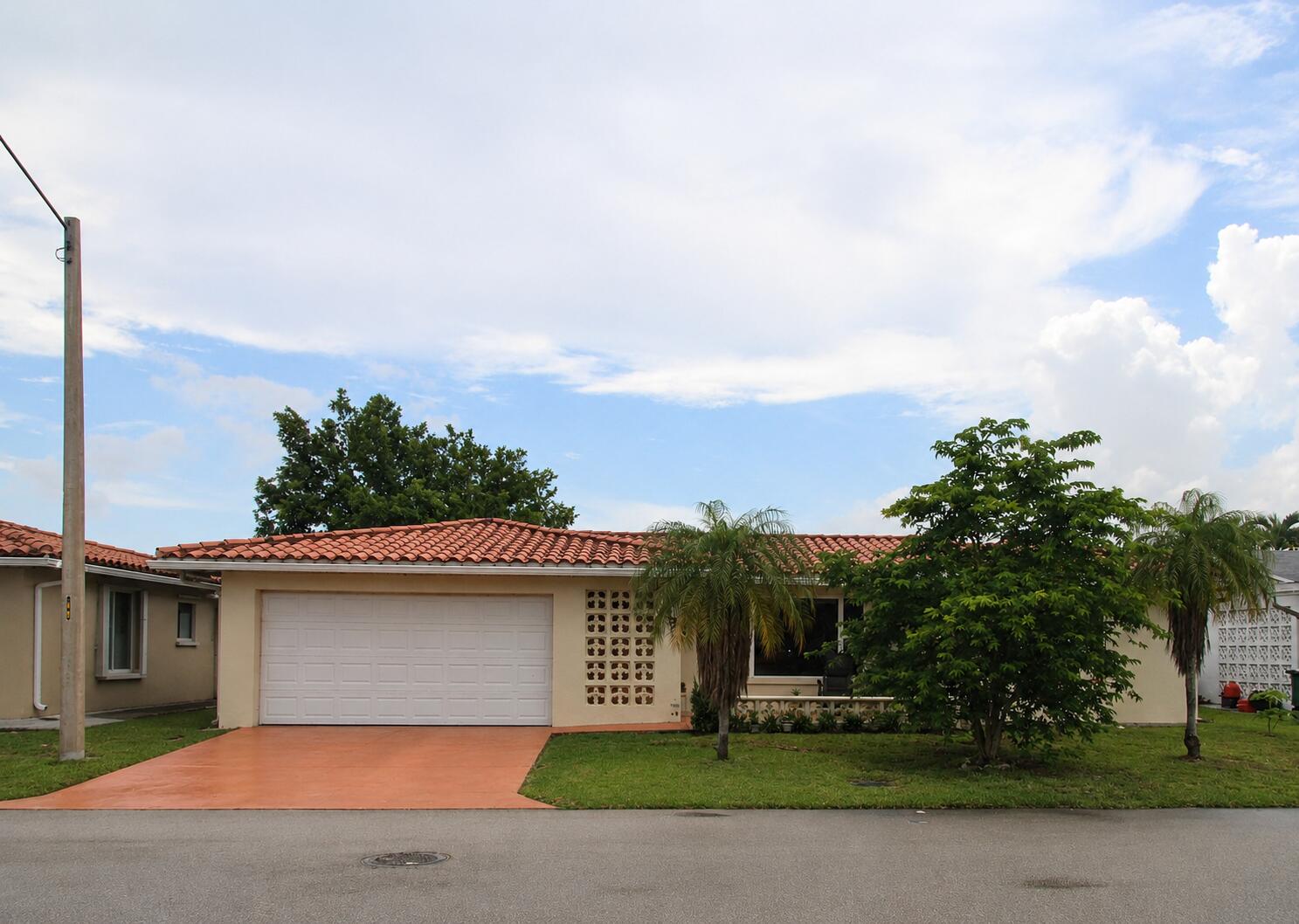 4914 Northwest 49th Road Tamarac, FL 33319 - Photo 1 of 19 4914 NW 49th Road - Front of House (upda