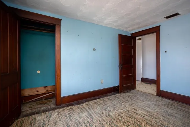 a view of a room with windows