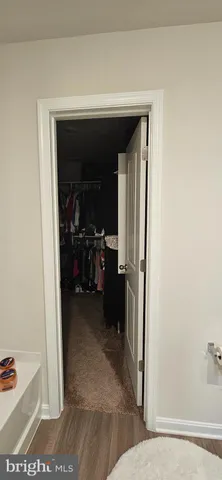 a view of living area and bedroom