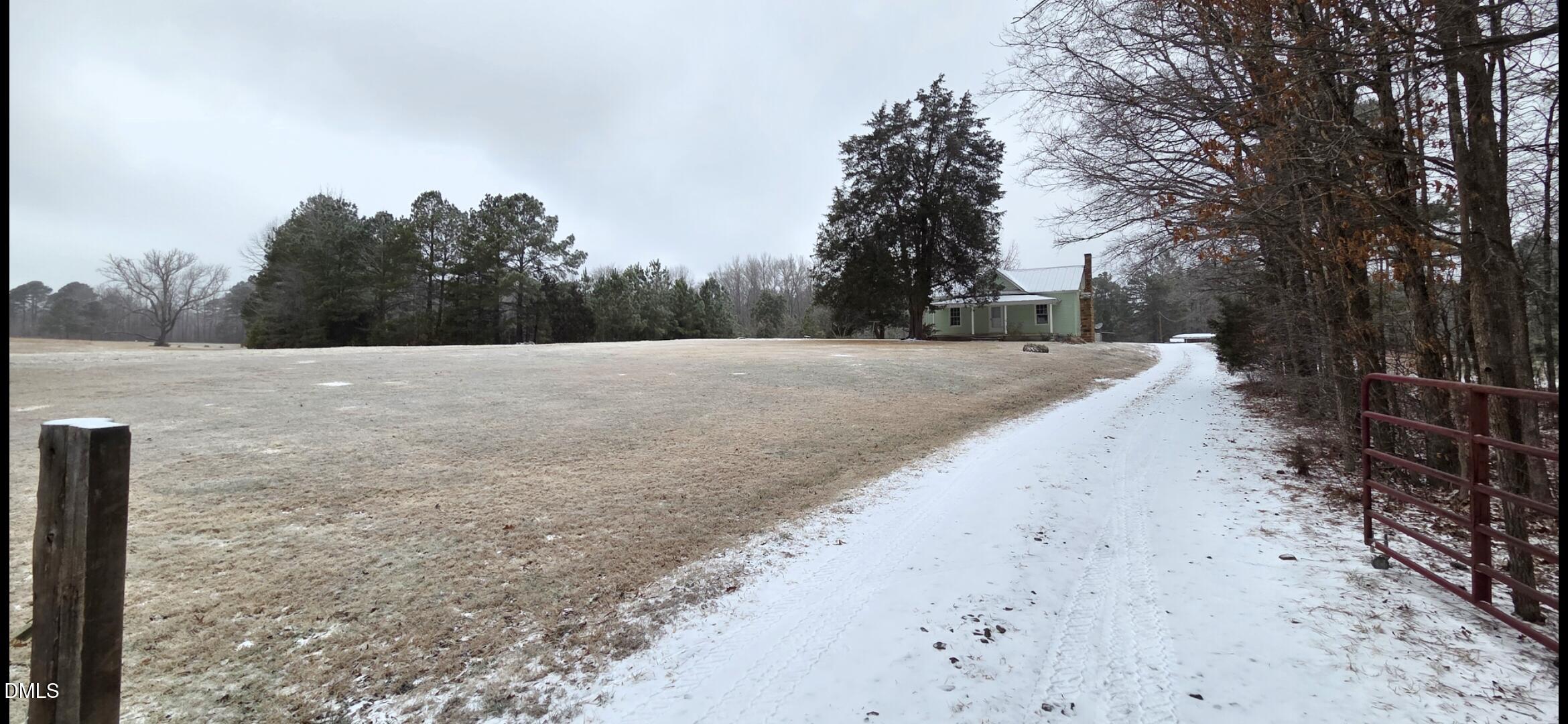 2523 Hamlin Road Durham, NC 27704 - Photo 15 of 19 a view of dirt field with trees in the background