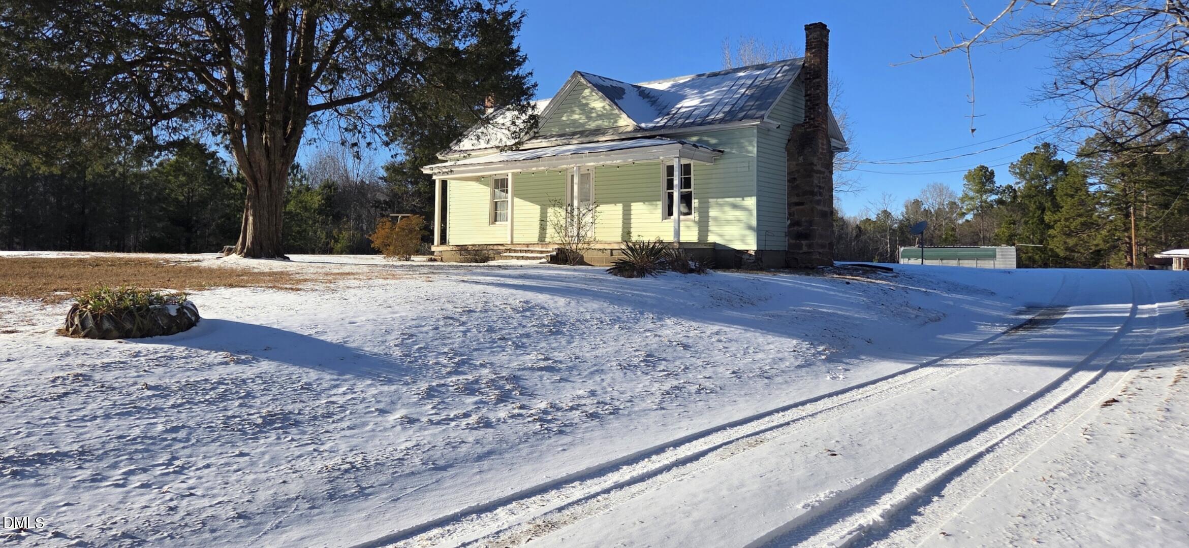 2523 Hamlin Road Durham, NC 27704 - Photo 19 of 19 a view of a house with a snow