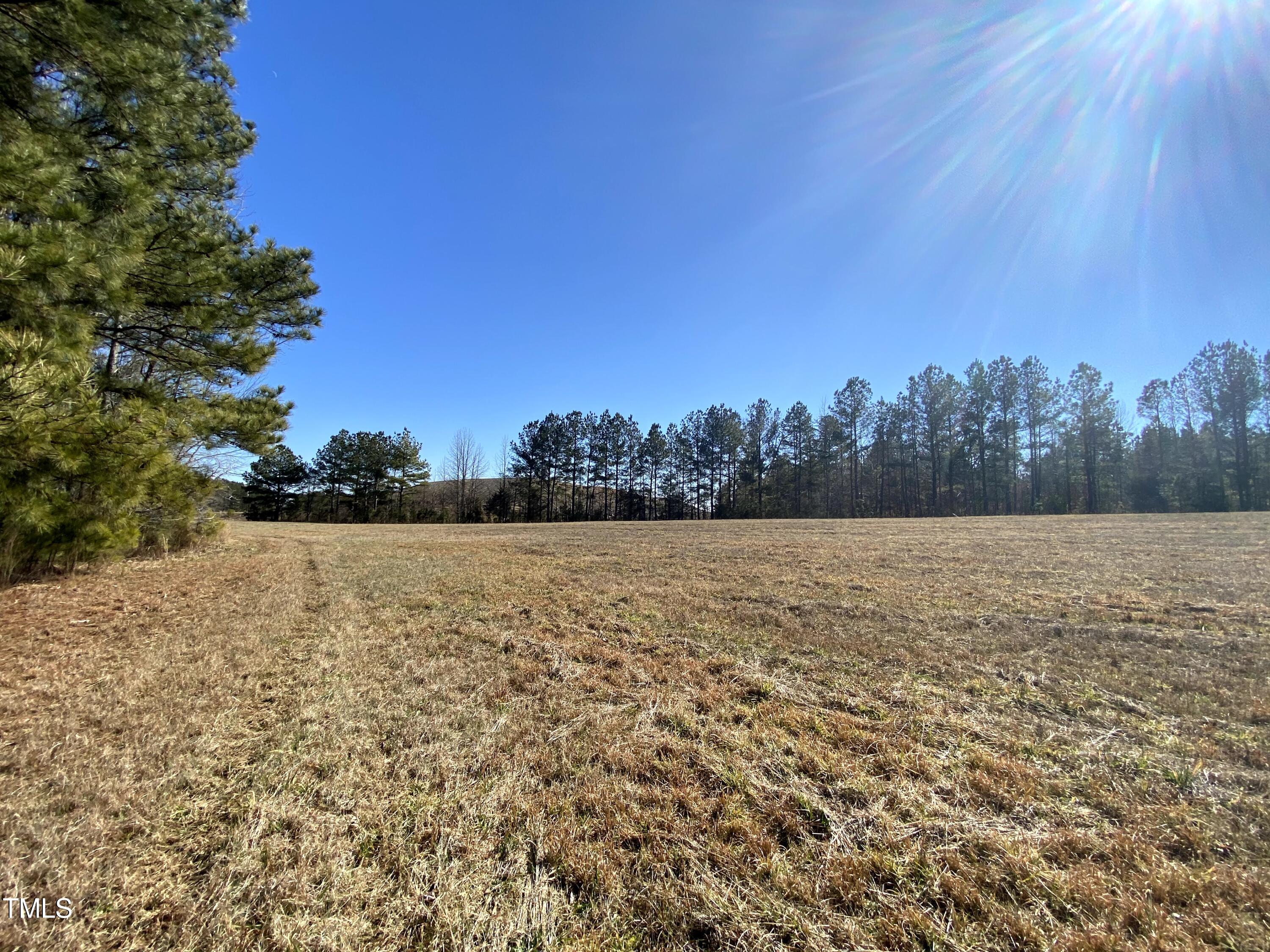 2523 Hamlin Road Durham, NC 27704 - Photo 2 of 19 a view of lake and mountain view