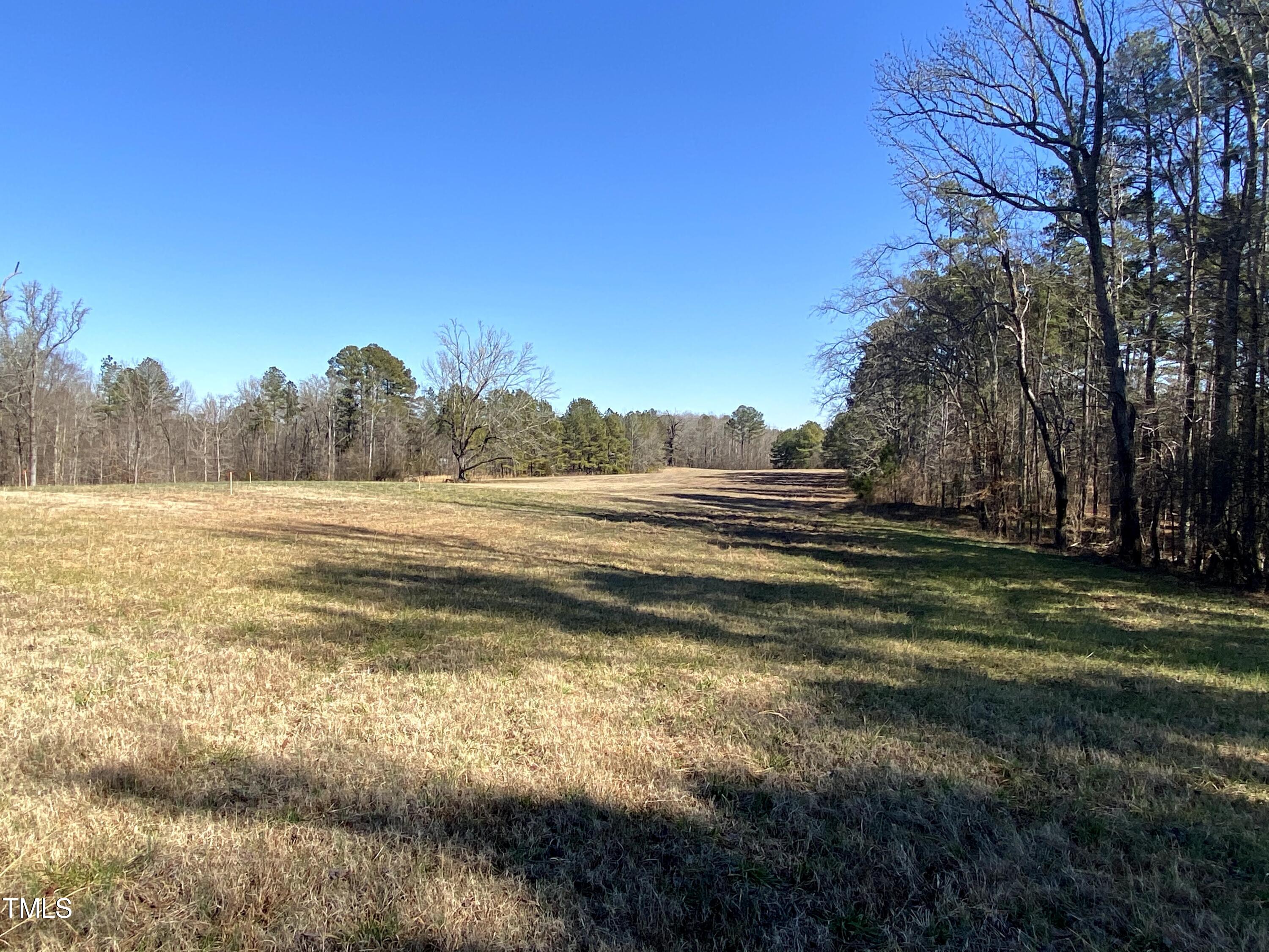 2523 Hamlin Road Durham, NC 27704 - Photo 9 of 19 a view of a lake view with beach