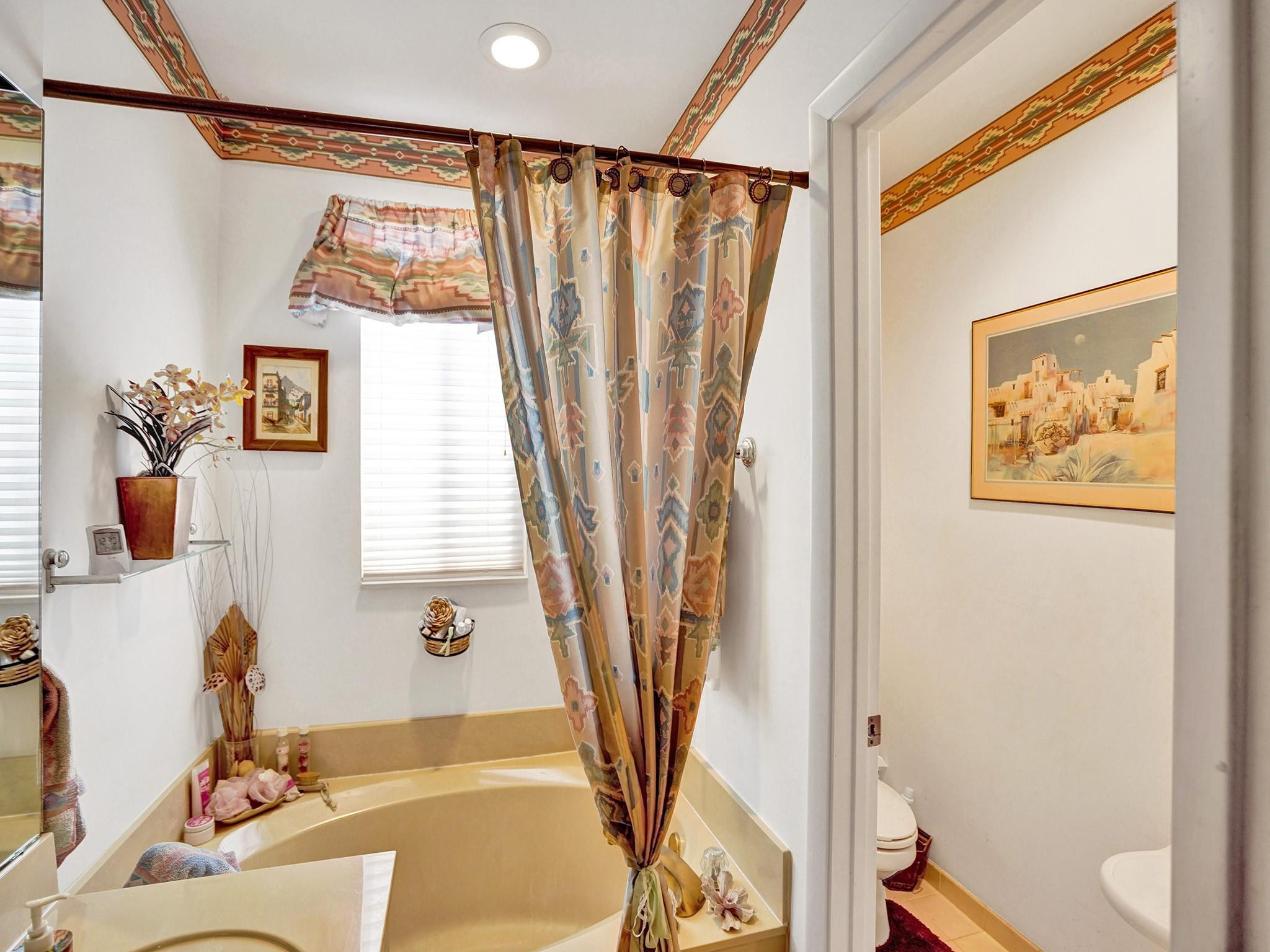 463 Talavera Road Weston, FL 33326 - Photo 54 of 59 a bath room with a sink and a bath tub