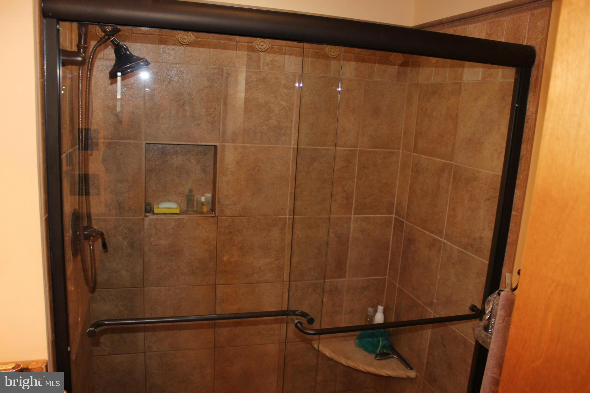 603 Old Point Road Chester, MD 21619 - Photo 23 of 30 a bathroom with a shower