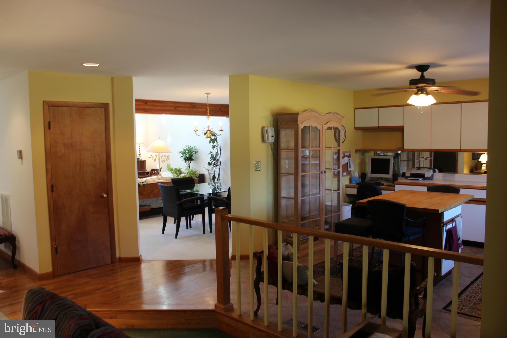 603 Old Point Road Chester, MD 21619 - Photo 9 of 30 a view of a dining room with furniture window and wooden floor