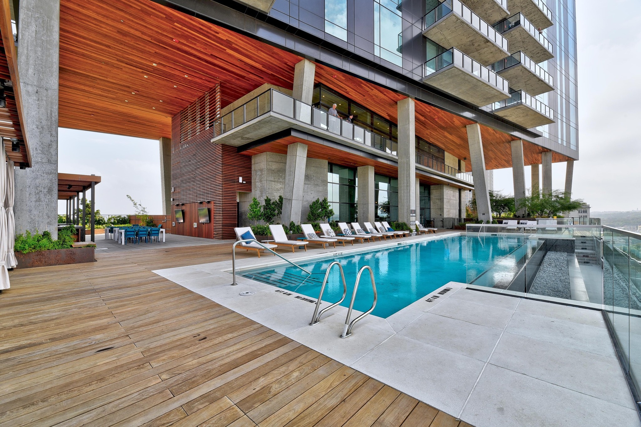 70 Rainey Street, Unit 1303 Austin, TX 78701 - Photo 16 of 31 An IMPRESSIVE photo of the pool area...let's go for a swim!