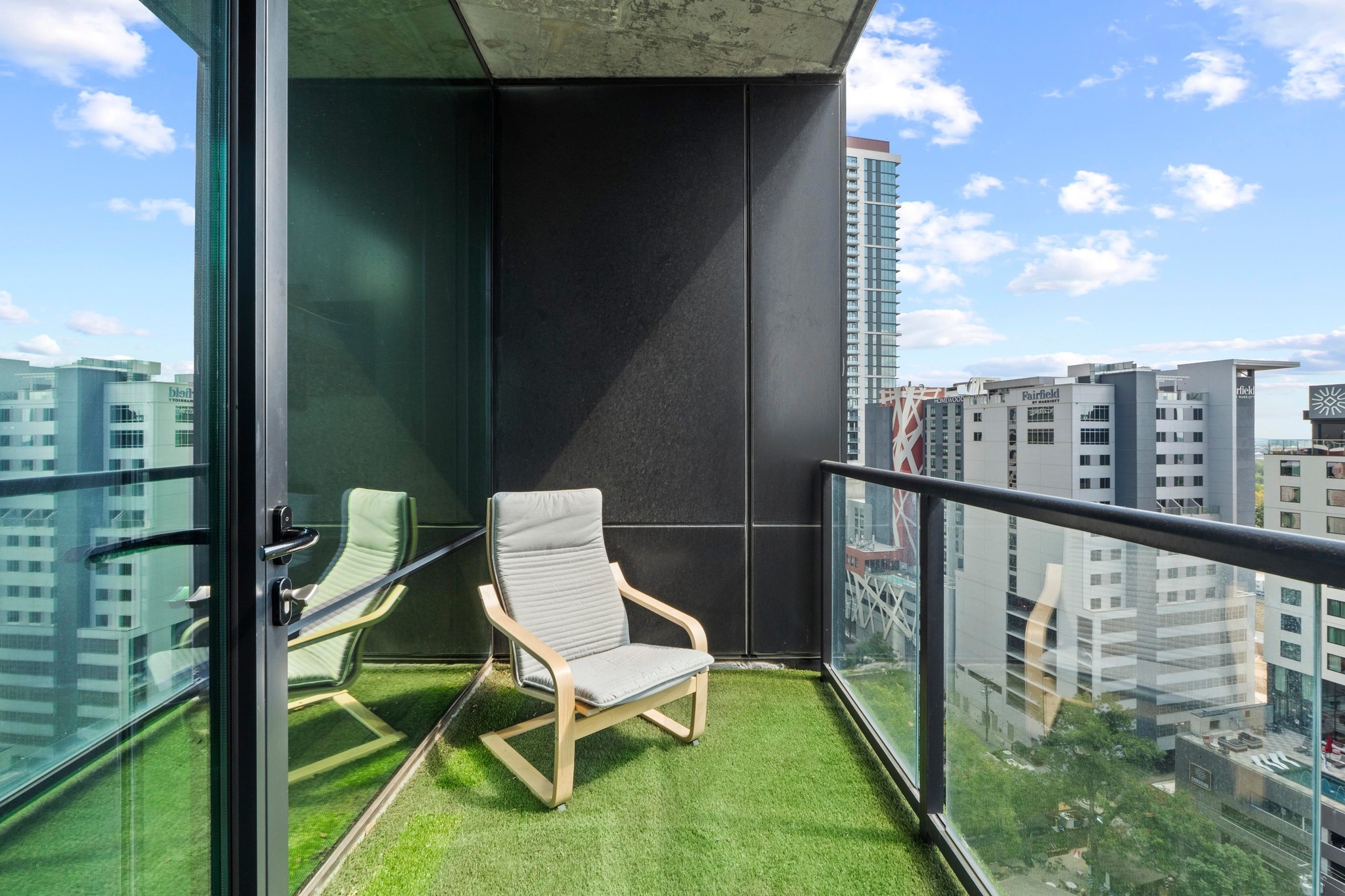 70 Rainey Street, Unit 1303 Austin, TX 78701 - Photo 9 of 31 Large covered balcony with Eastern and water views.