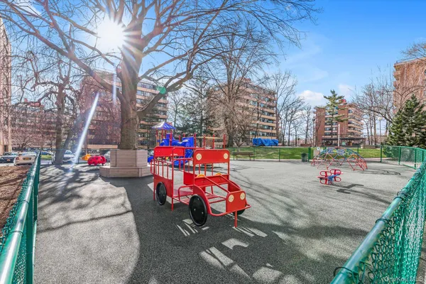 a view of building with a swimming pool