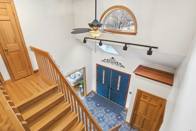 a view of entryway with a front door