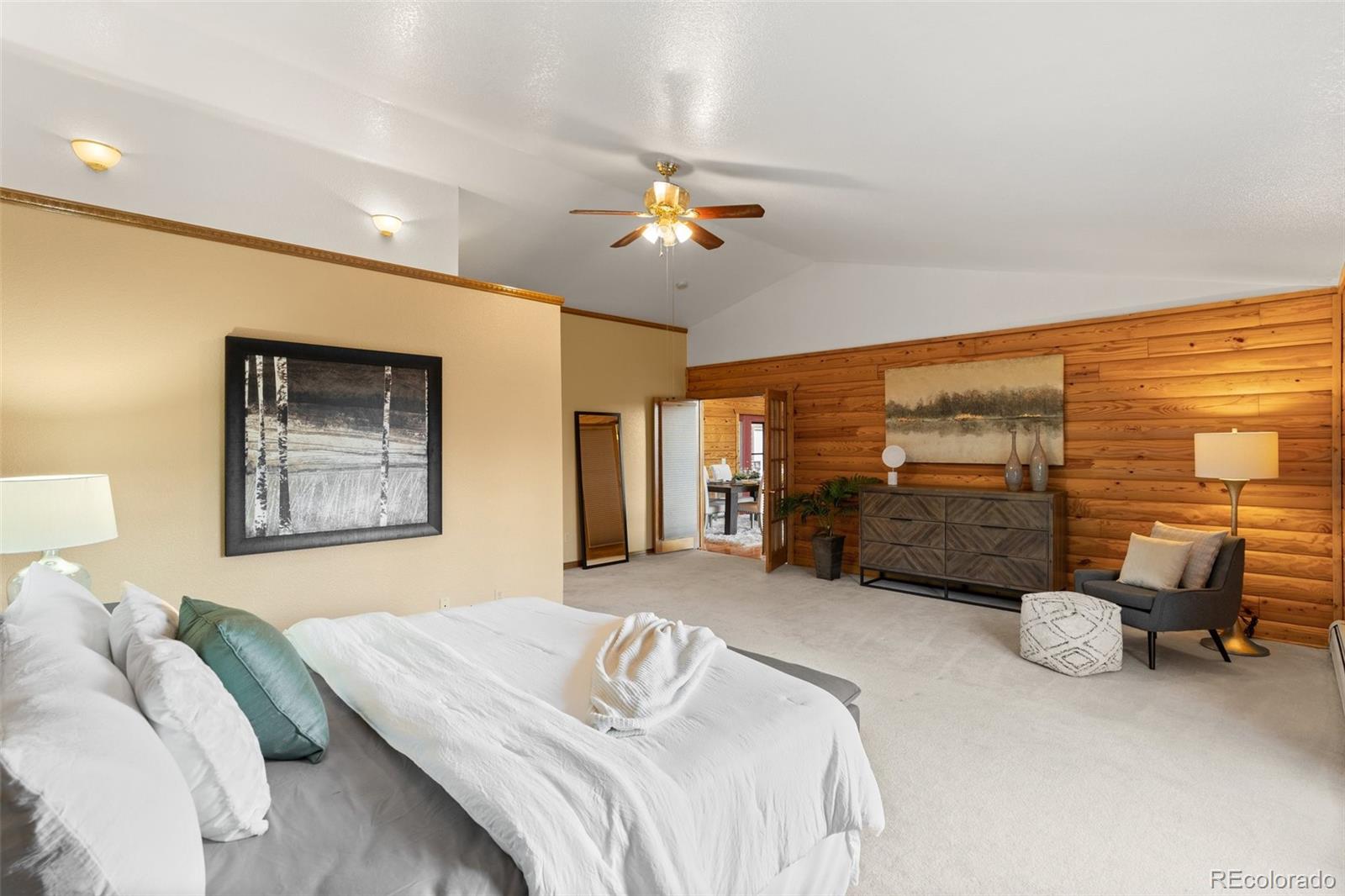 10248 Christopher Drive Conifer, CO 80433 - Photo 17 of 40 a bedroom with furniture and a large window