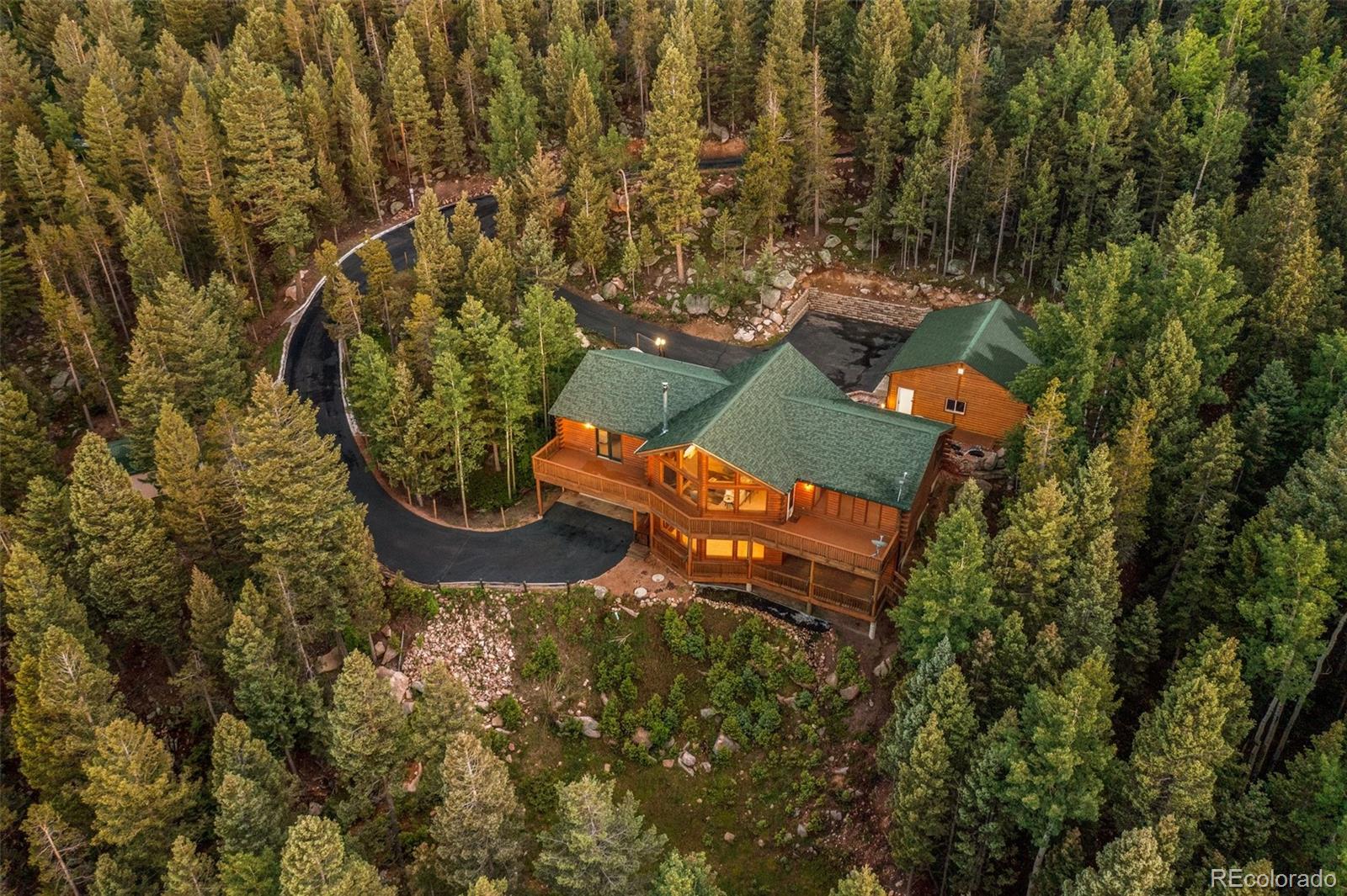 10248 Christopher Drive Conifer, CO 80433 - Photo 22 of 40 an aerial view of a house with outdoor space