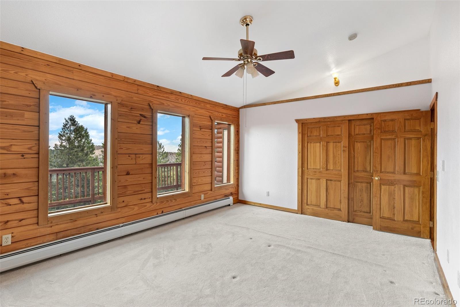 10248 Christopher Drive Conifer, CO 80433 - Photo 25 of 40 a view of an empty room with a window
