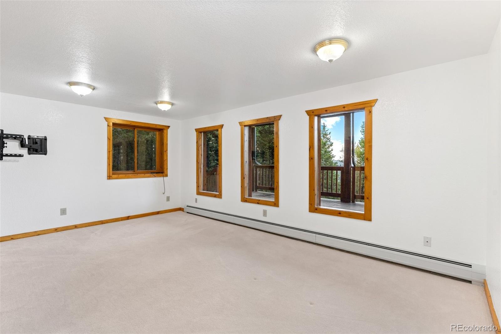 10248 Christopher Drive Conifer, CO 80433 - Photo 31 of 40 a view of an empty room with a window