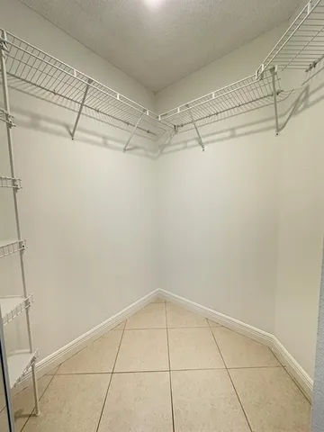 a view of a room with racks on the wall