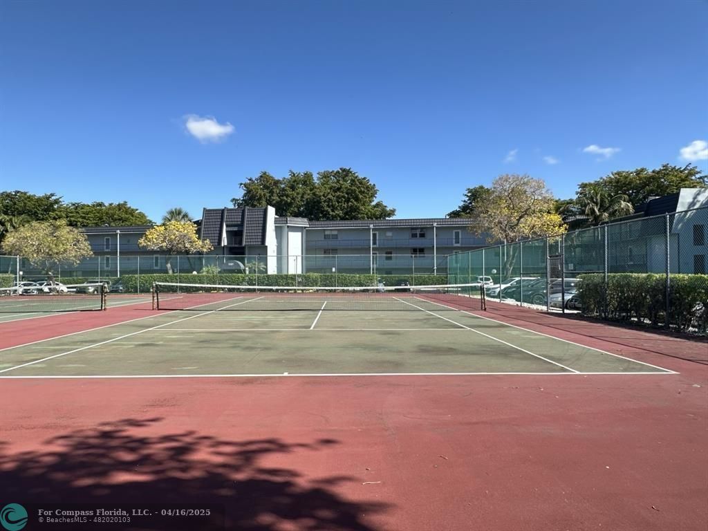 9401 Lime Bay Boulevard, Unit 115 Tamarac, FL 33321 - Photo 17 of 18 a view of basketball court