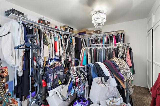a bedroom with a bed and gym equipment