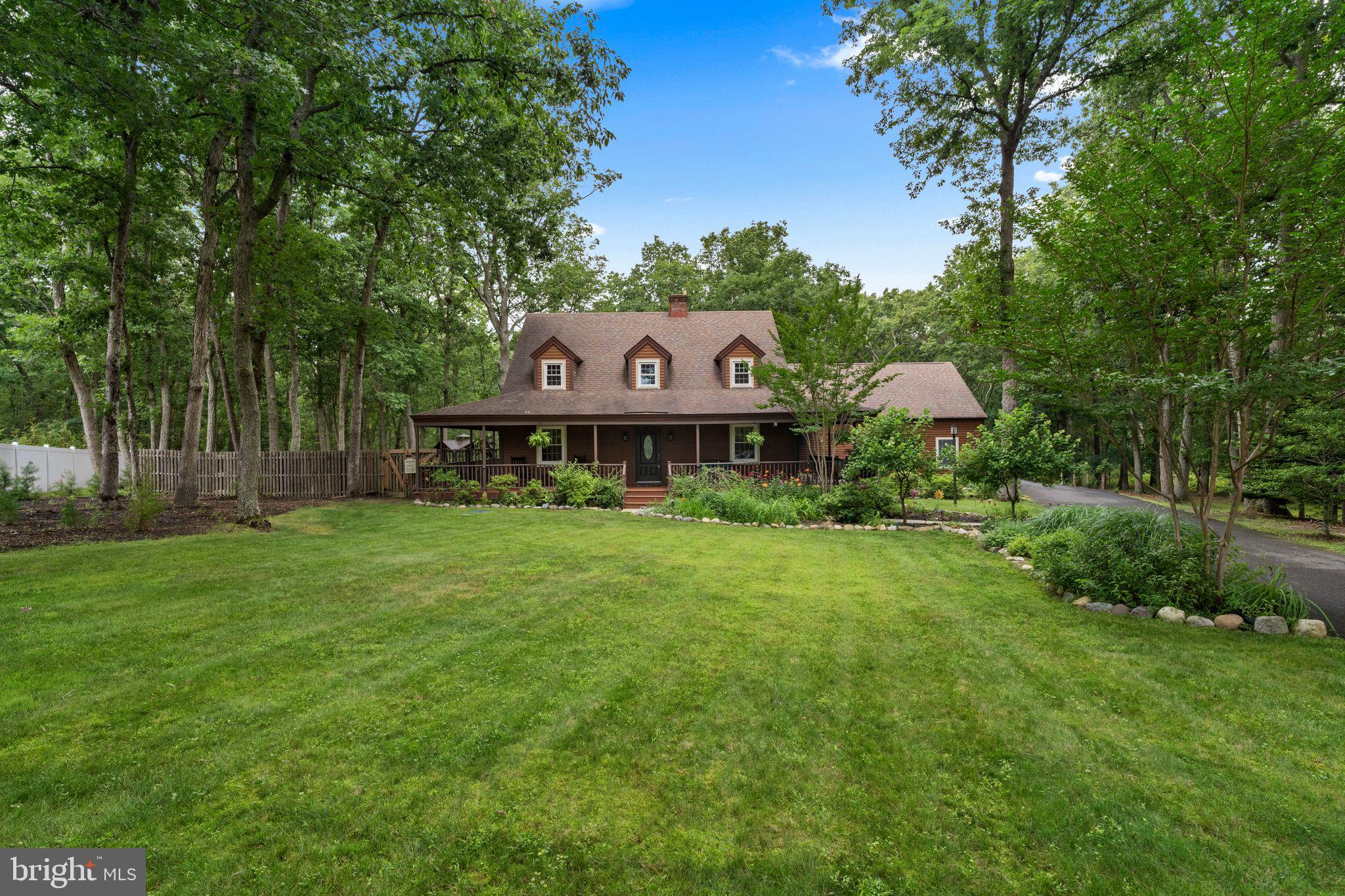 16 Dunhill Road Jackson, NJ 08527 - Photo 1 of 44 Charming home nestled in lush greenery.